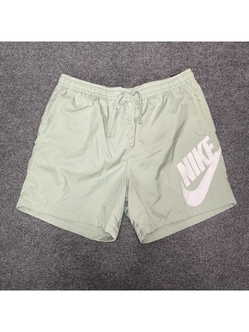 Nike Men's Light Green Athletic Shorts with White Logo